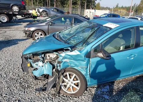 2013 Toyota Prius C Four z USA, uszkodzony, nr VIN JTDKDTB30D1045445